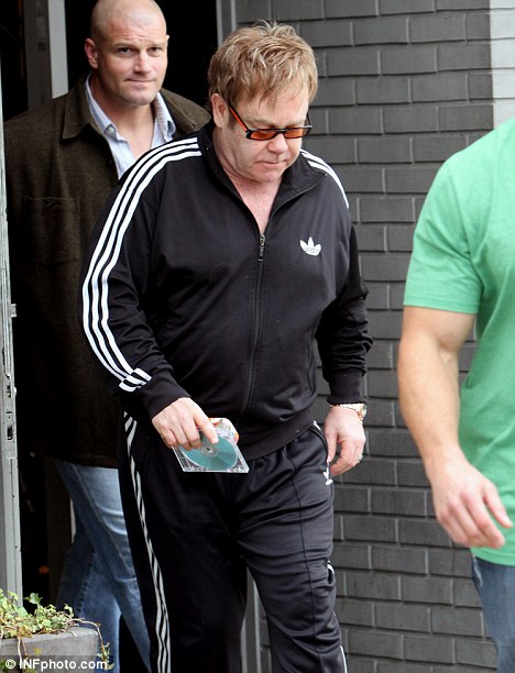 He's still standing: Despite the lack of sleep with a new-born, Sir Elton John looked fighting fit in his tracksuit as he left a recording studio in Los Angeles yesterday